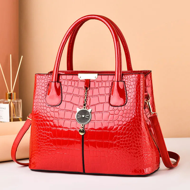 Bright leather handbag 2023 autumn and winter new stone pattern women's bag large capacity single shoulder messenger bag